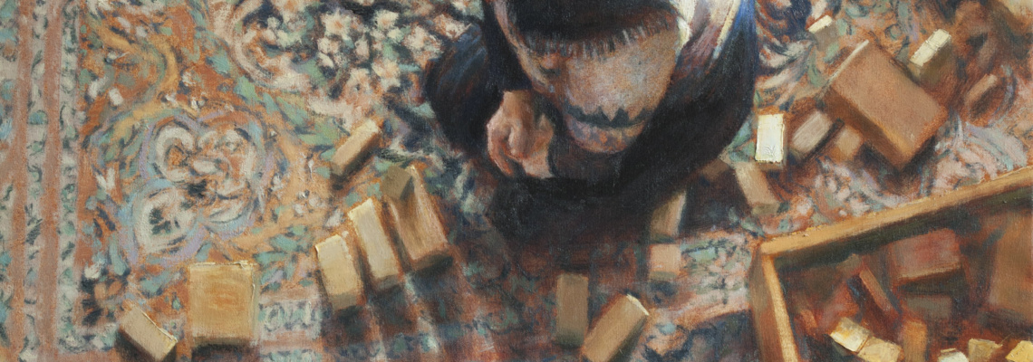 Painting of young boy and wooden blocks